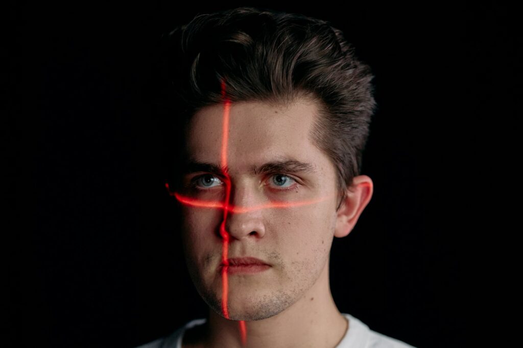 Portrait Photo of Man with Laser Lines on his Face